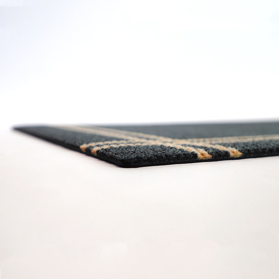 Low profile shot of doormat in black and tan