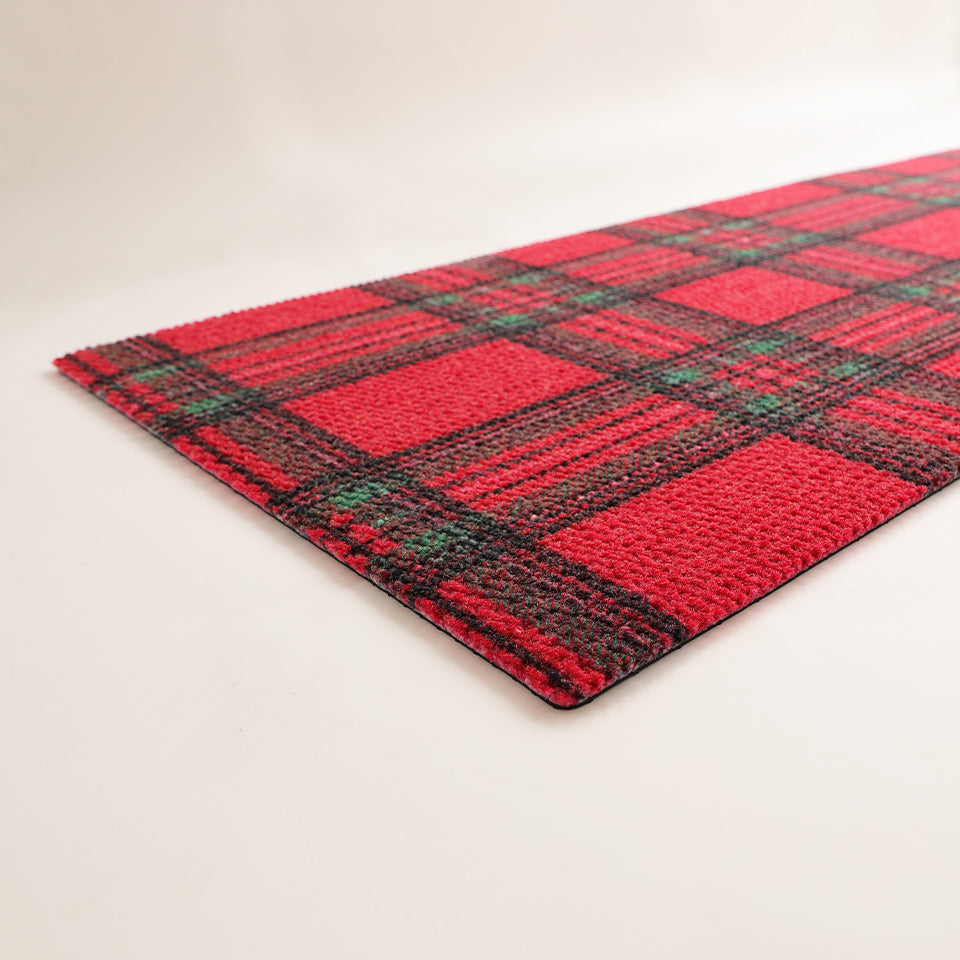 Low profile view of Tartan plaid red and green holiday plaid doormat