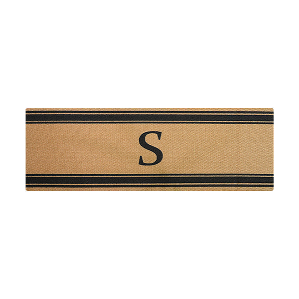 Double door sized doormat in coir with black stripes and a black monogram
