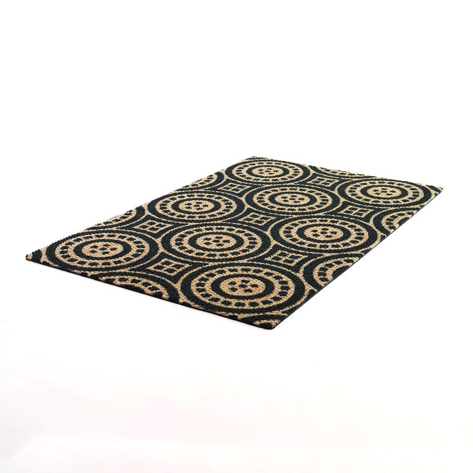 Isolated angled shot of Medallions doormat in coir and black.  Circular patterned doormat with dots