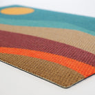 Close up corner shot of mountain sunset MCM inspired doormat design