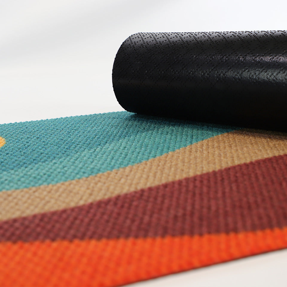 Rubber doormat backing closeup on MCM inspired Mountain Sunset doormat design