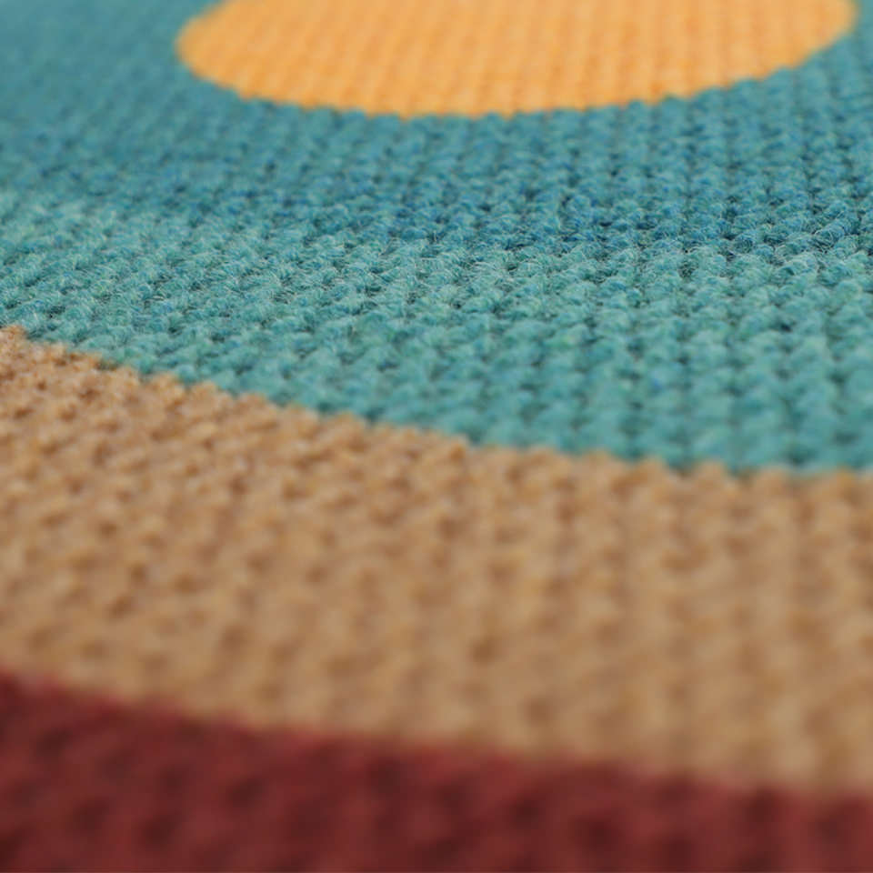 Close up of non shedding doormat fibers on mountain sunset doormat