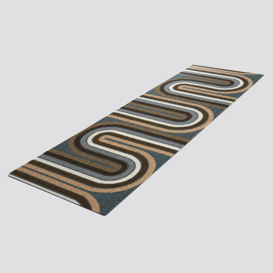 Angled shot of Retro Vibes in a mix of browns and greys from our mid-century modern collection of doormats.  MCM doormats are the perfect nostalgic retro feel for your modern day home.