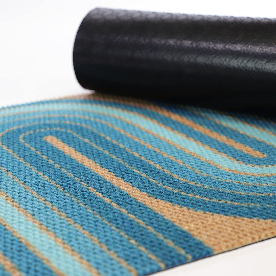 Rubber backing on our mid century modern doormats helps prevent slipping and sliding.  Aqua and coir Retro Vibes doormat with non shedding fibers
