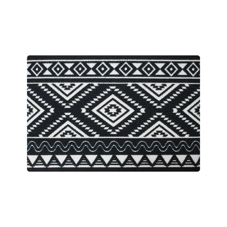 Southwestern single door doormat in black and white features a great southwest design. Exceptional mat that catches and traps sand and dirt. Made with recycled materials like recycled bottles and rubber.