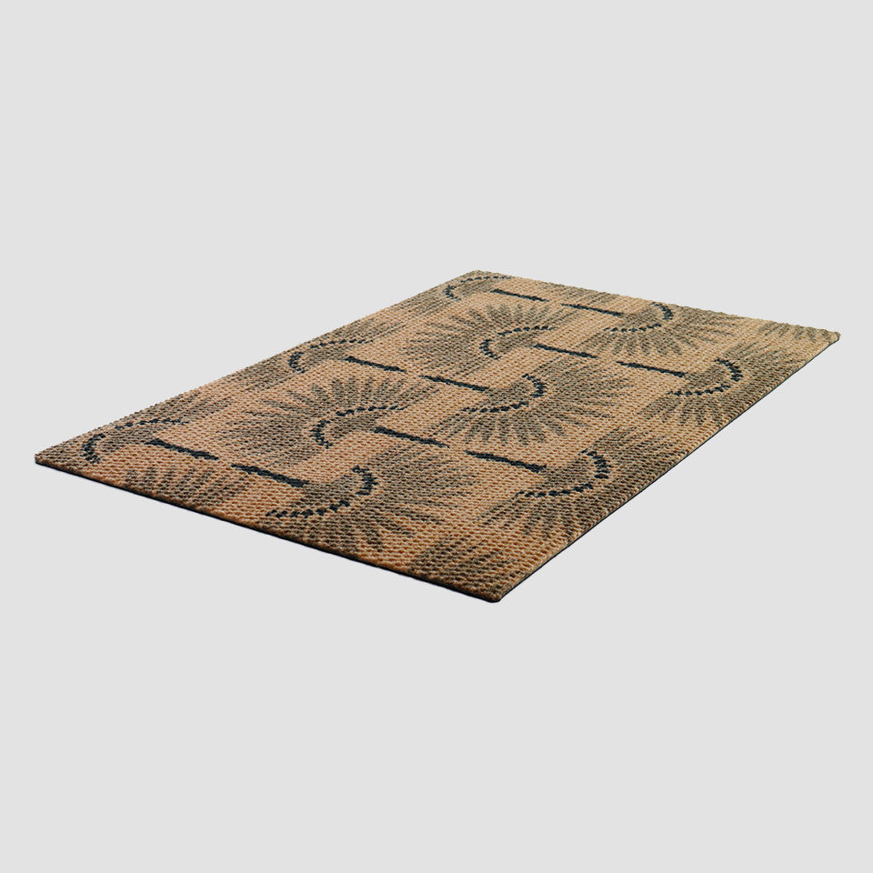 Angled shot of our Tailfeathers doormat in coir and black.  Modern crane design for a retro feel with a classic look.