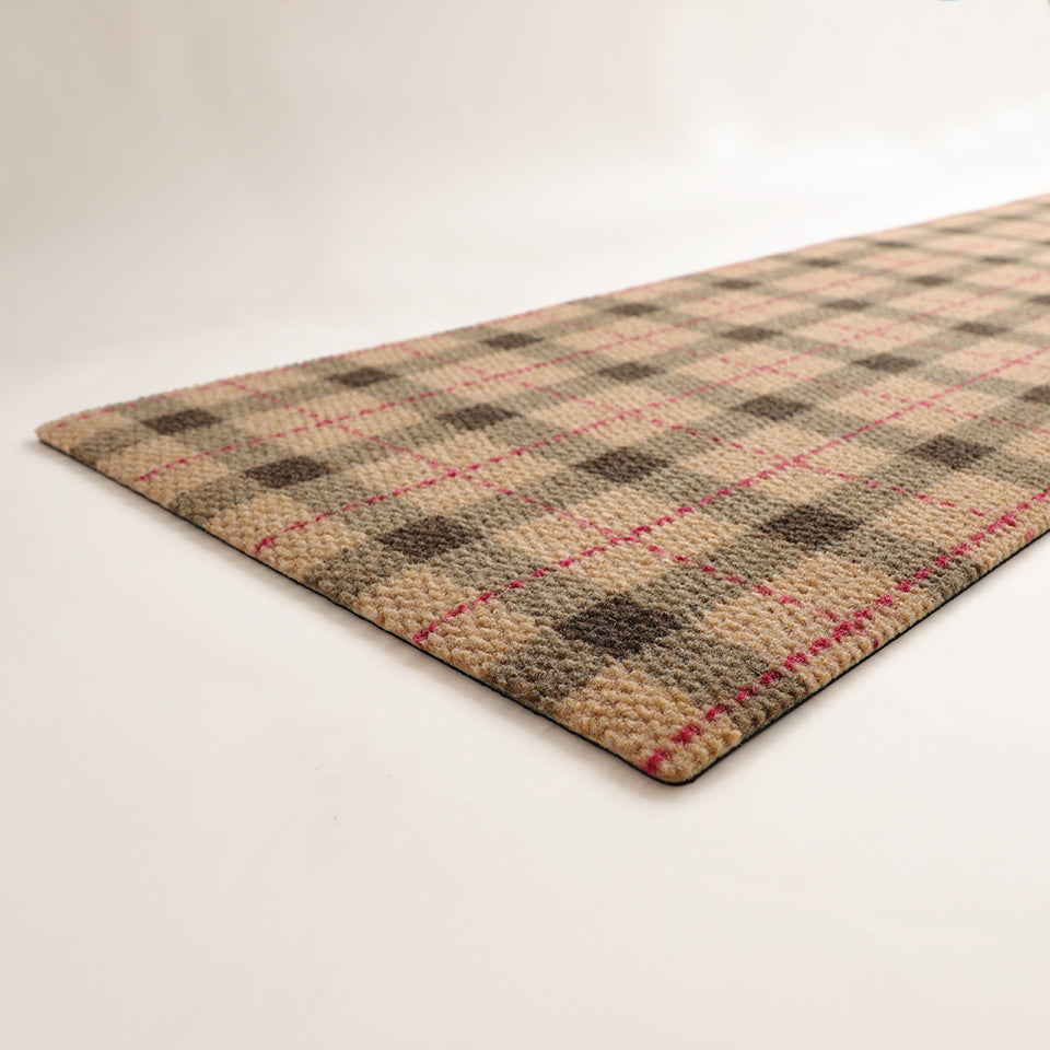 Tattersall Plaid double door mat is an oversized mat with a unique hob nail texture that will protect your floors. The low-profile design and rubber backing makes it a safe doormat that will stay in place and will keep your floors clean.