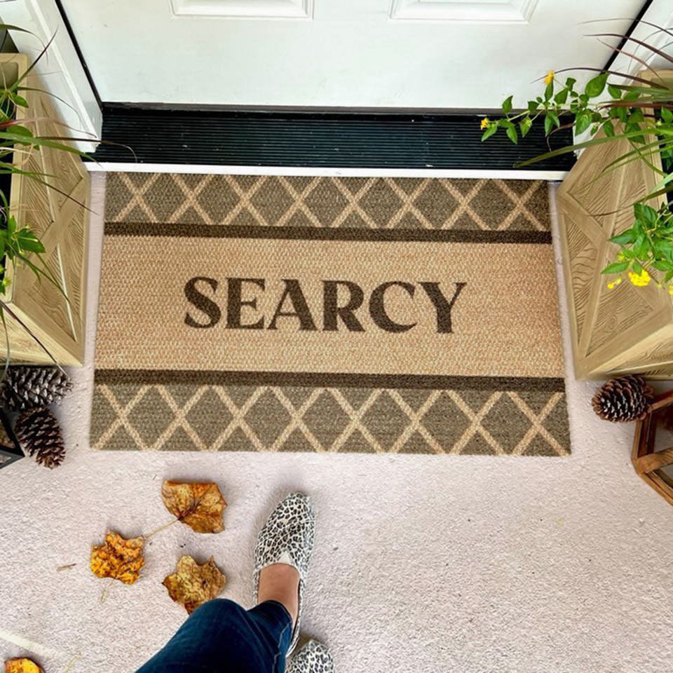Argyle personalized mat with last name "searcy" in front door entryway