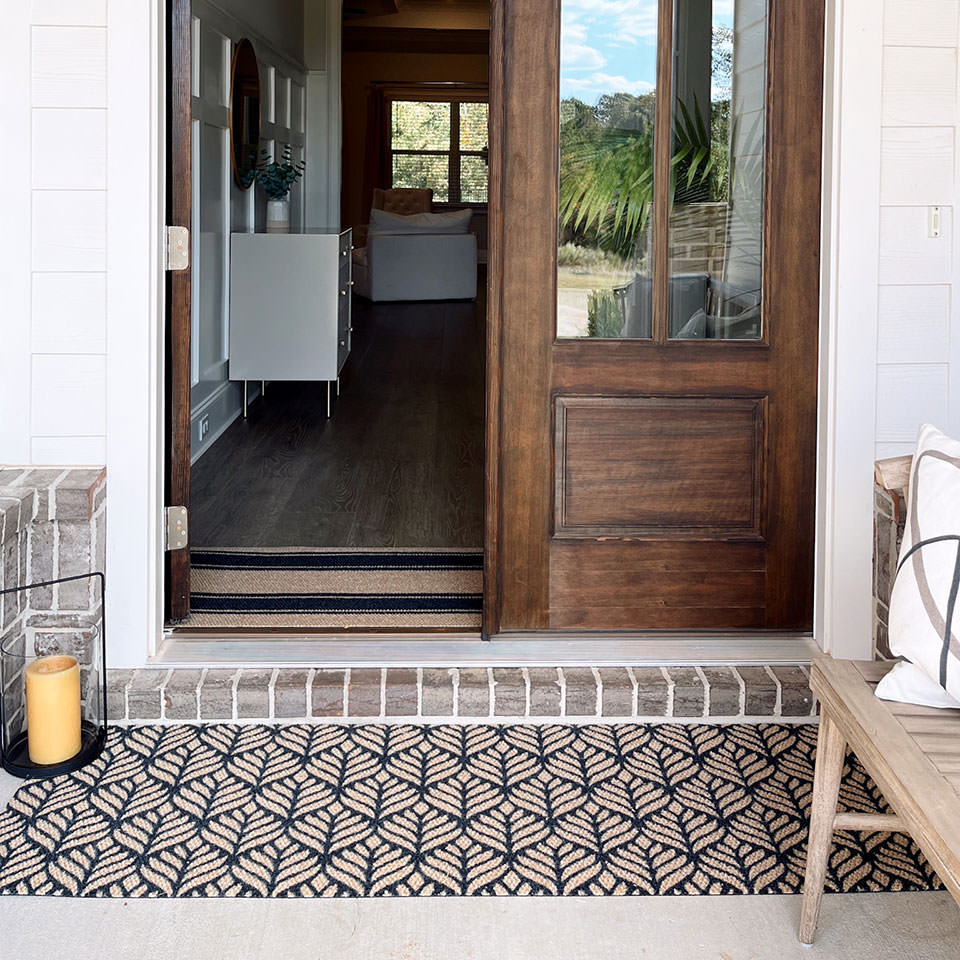 double door size botanical black and coir doormat in front of double front door