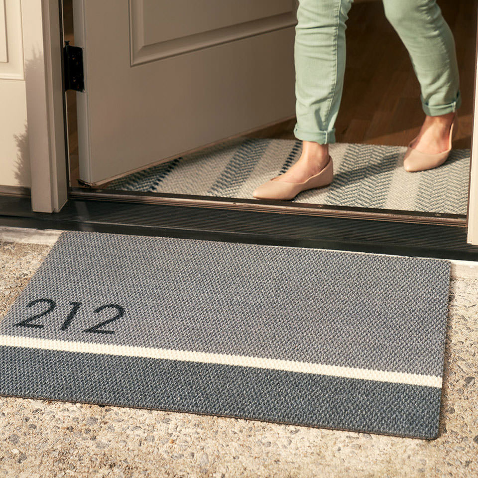 Grey and white personalized doormat with house number