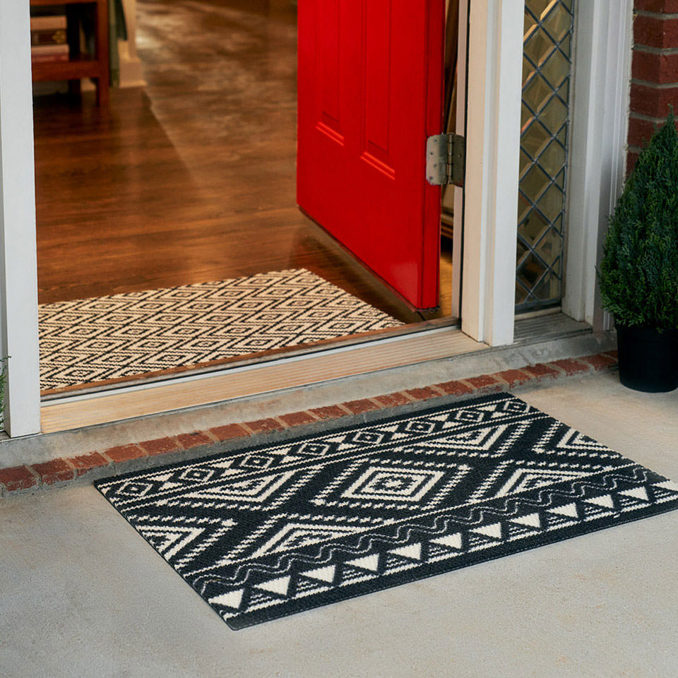 Southwestern single door doormat in black and white. Low profile design helps reduce the chance of slip and falls while featuring a classic southwest design.