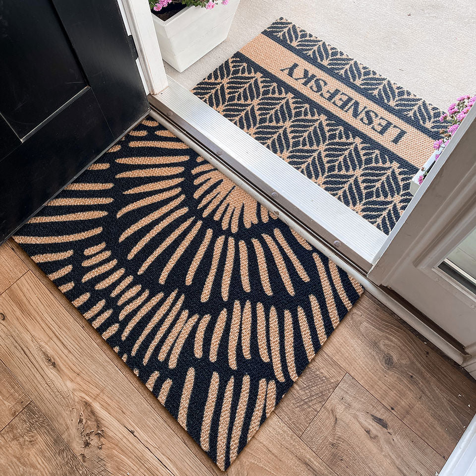 Sunburst single door doormat pairs perfectly with a personalized Matterly mat. A fun designed floor mat that's made from recycled materials and made in the USA.