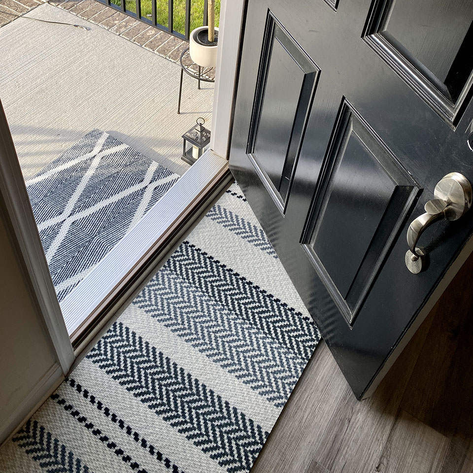 Textured Stripes in grey is a classic design that looks great in any foyer or home entrance. Can be used as a door mat or decorative mat.